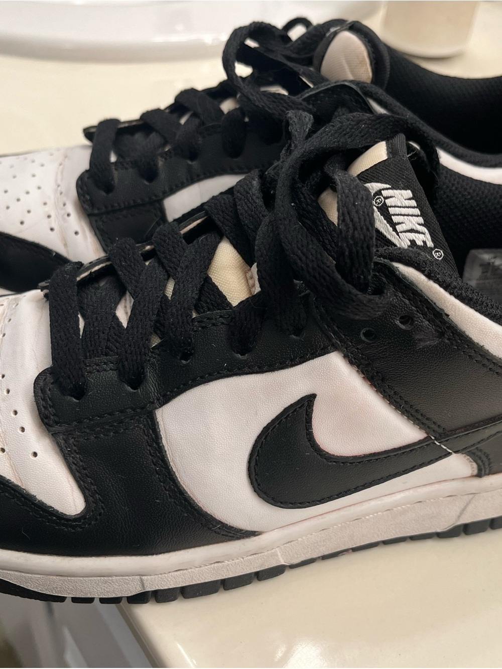 Nike Black and White Low-Top Swoosh Sneakers
